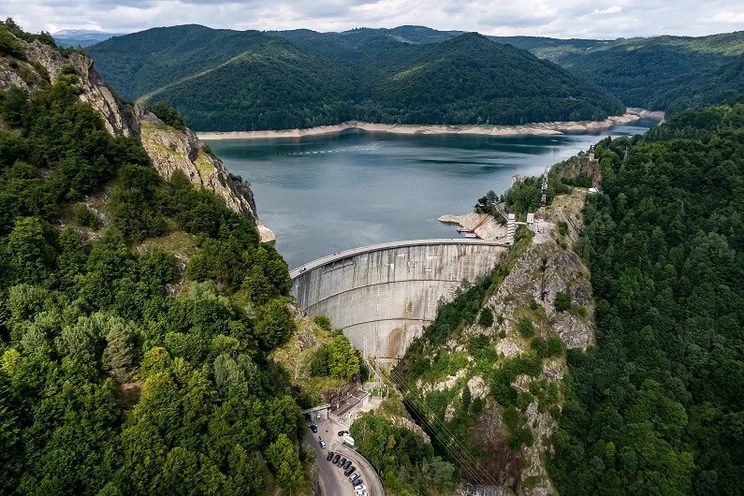 Water dam; water can be released to power turbines that generate electricity