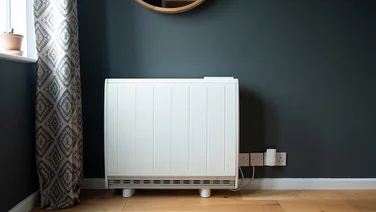 storage heater attached to wall in house